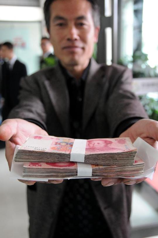 哈尔滨百名农村贫困残疾人将逐步获得扶残助农贴息贷款(组图)