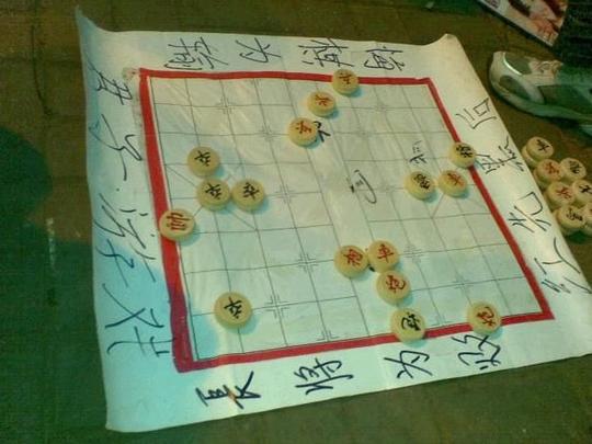 路边象棋残局你不玩,打弹珠骗局也别碰,揭秘打弹珠