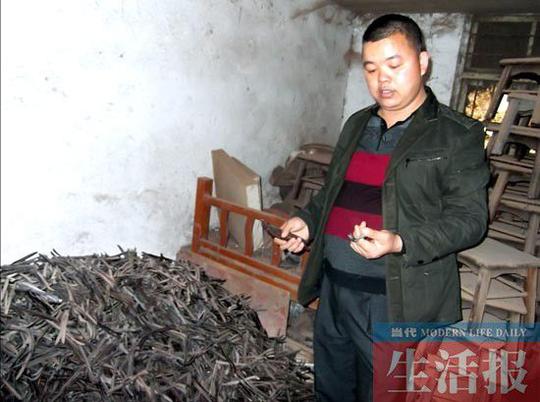 男子回乡艰辛创业小小茶叶夹"夹"出一片天(组图)