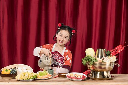 古装国潮吃火锅的小女孩图片下载
