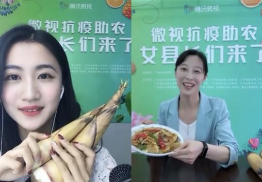 德庆县副县长安一宁端出农产品特色菜.jpg