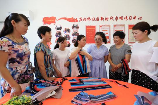 通过创业培训为社区妇女搭建学习交流平台,创造就业创业机会,帮助她们
