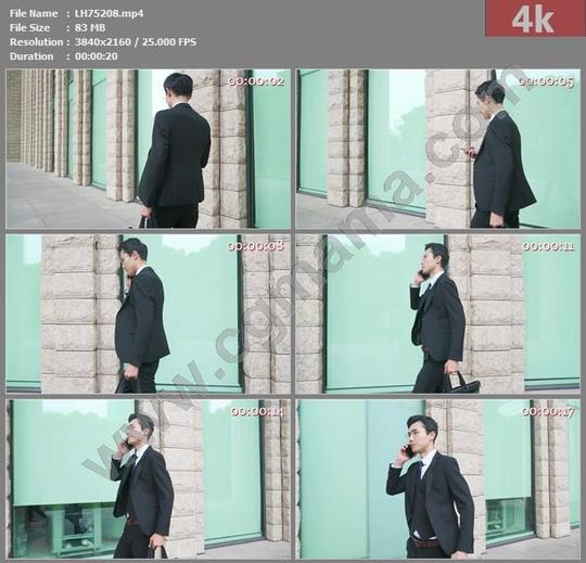 lh75208商务男性行走接打电话4k实拍视频素材