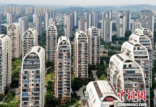 房产动态返回首页资料图:图为航拍一处楼盘.