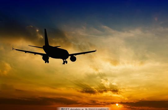 夕阳下的飞机夕阳下的飞机图片素材客机航空飞机交通工具傍晚