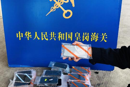 货柜车特制暗格藏215部苹果手机,入境深圳时被x光机识破
