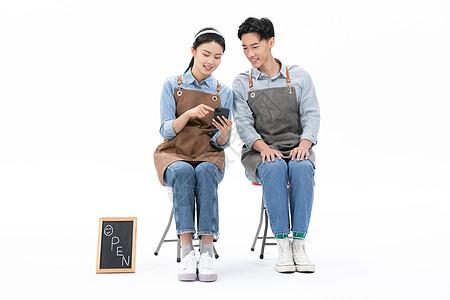 青年小店夫妻创业形象图片下载