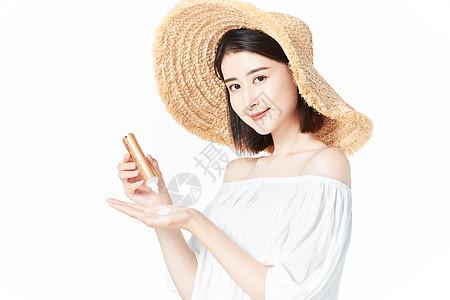 美女涂防晒图片下载