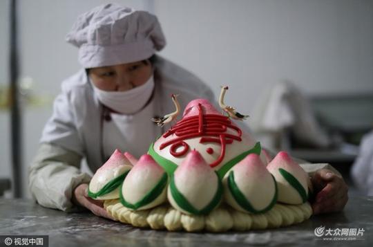 组图山东青岛王哥庄大馒头蒸出红火日子