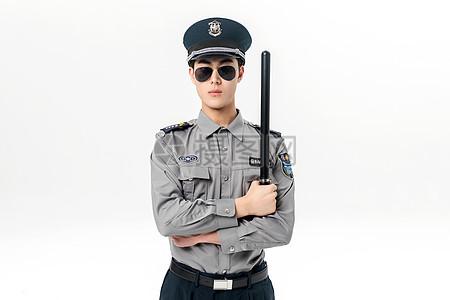 保安拿着警棍图片下载
