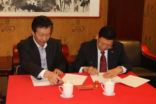 国骅签署中联国兴书画院合作意向书,推动国骅文化产业发展