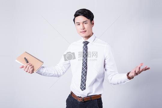 拿着本子摊手焦虑商务白领