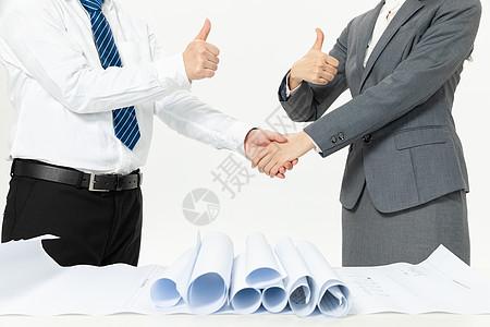 商务人士合作握手背景素材