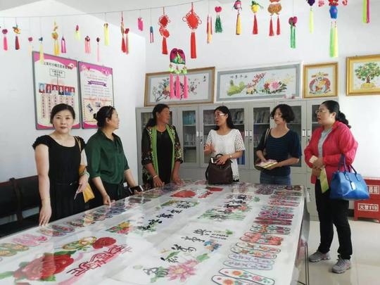 西宁市妇联组织妇联干部到海南州贵德县学习村（社区）“会改联”及妇联区域化建设工作