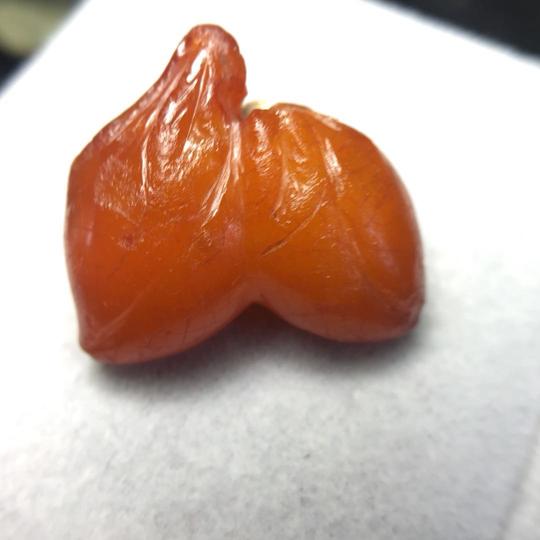 从宫廷藏宝来看明清时期老蜡帽花花片雕刻件的艺术价值特征