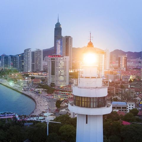 龙口市和大连市哪个好