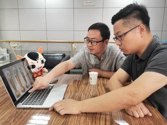 独家揭秘！第十一届全国民族运动会奖杯奖牌竟出自郑州这两位“80后”之手