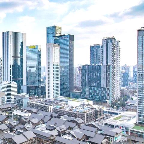 青岛和哈尔滨那个城市大一些？