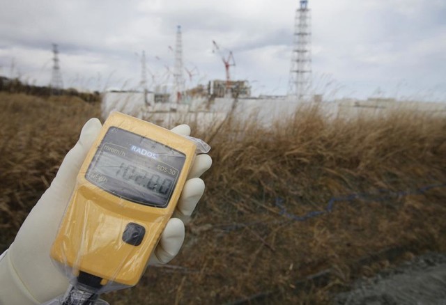 Robot working in hazardous environment with protective gear